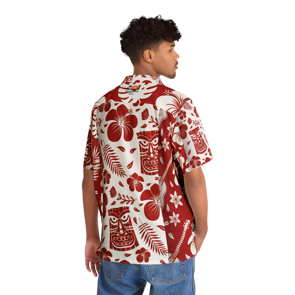 A man wearing a red and off-white Hawaiian shirt with a tiki and floral print, shown from the back against a white background.