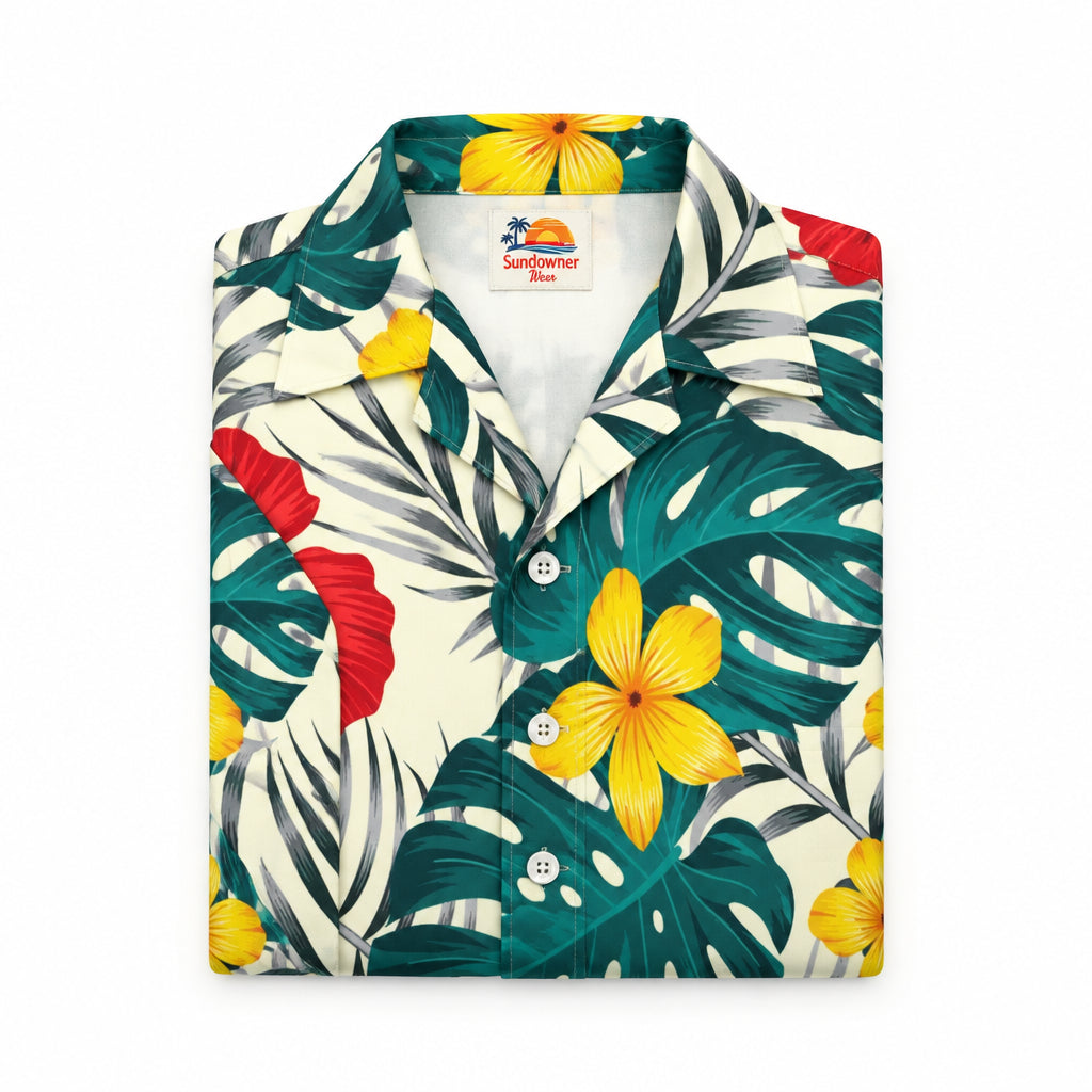 A short-sleeve button-up Hawaiian shirt with a vibrant tropical print featuring large green monstera leaves, yellow hibiscus flowers, and red flowers on an off-white background.